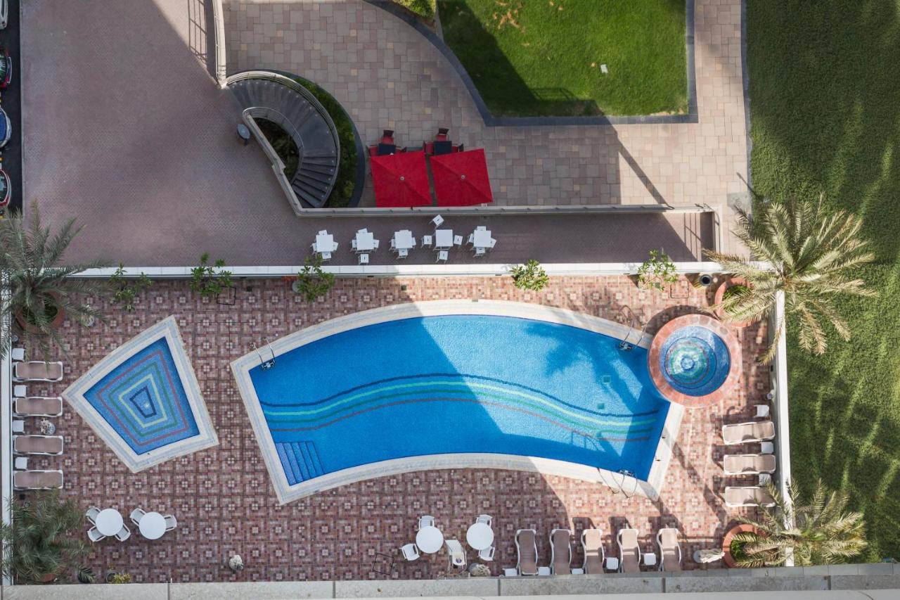 Higuests - Cozy Studio With Panoramic Views On The Lake Dubai Exterior foto